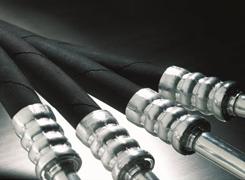 Black hydraulic hoses with metal fittings. Black hydraulic hoses with metal fittings.