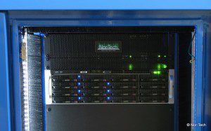 Server rack with glowing indicator lights. Server rack with glowing indicator lights.
