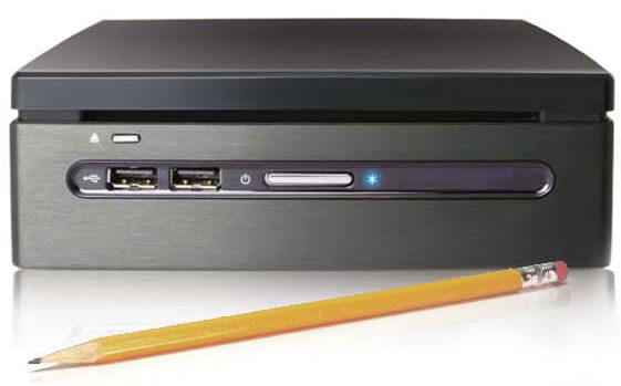 Compact desktop computer with yellow pencil. Compact desktop computer with yellow pencil.