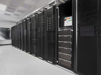 Data center server racks in a row. Data center server racks in a row.