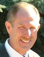 Smiling man outdoors in a suit. Smiling man outdoors in a suit.