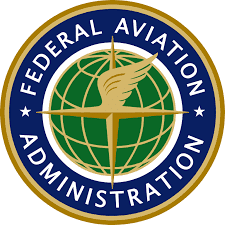 Federal Aviation Administration logo with globe design. Federal Aviation Administration logo with globe design.