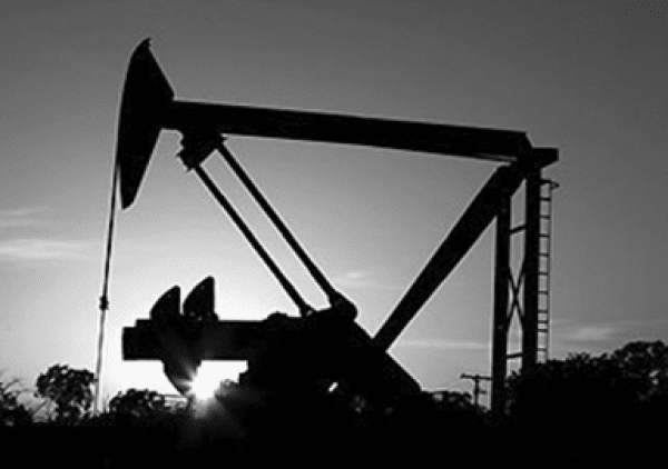 imgi_44_oil-and-gas-600x422 Silhouette of an oil pump jack at sunset.
