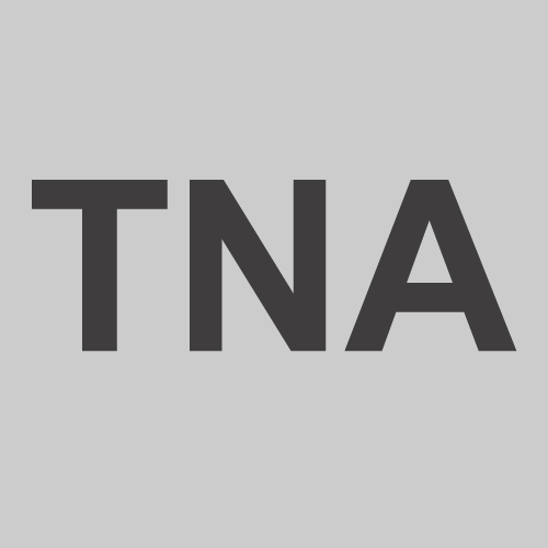 Bold letters "TNA" on gray background.