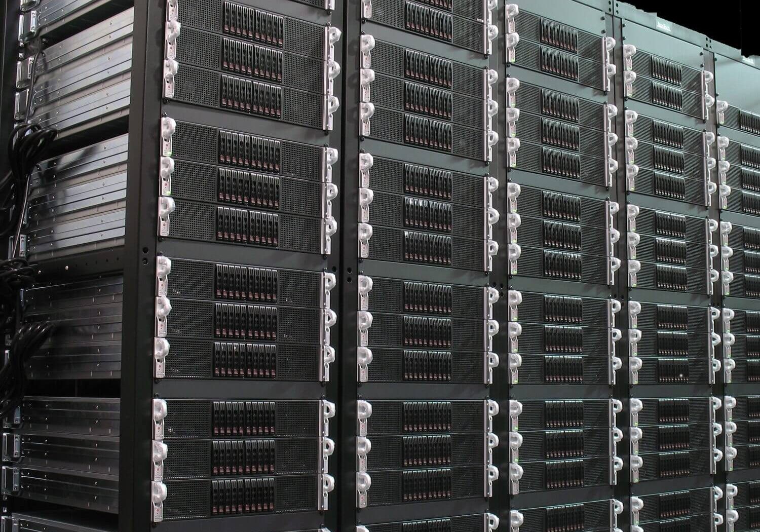 Server racks in a data center room.