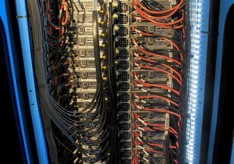 Data center server racks with cables.