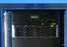 Server rack with glowing indicator lights.