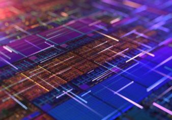 Colorful microchip with glowing lines.