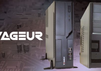 Voyageur computers with logo in background.